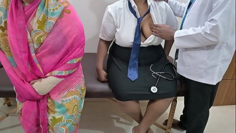 Doctor using patient infront of guardian